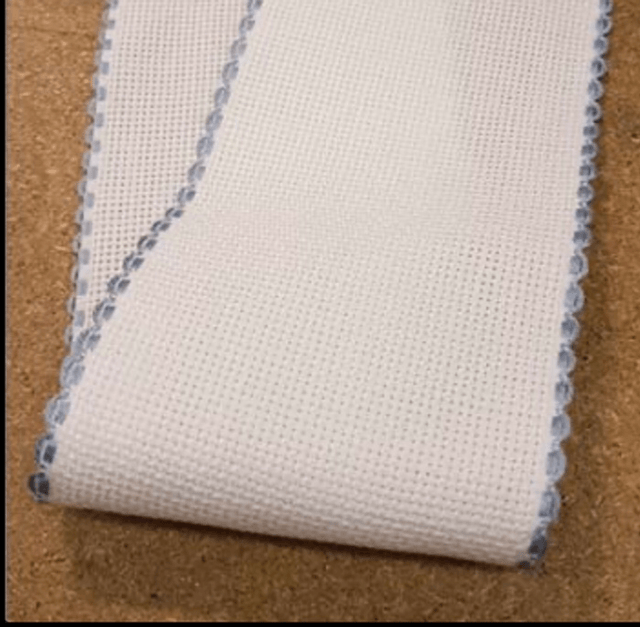 1” Aida White Band with a pale blue edging (Per metre)